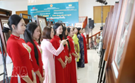 Vietnamese in Laos, Singapore honor President Ho Chi Minh on National Day